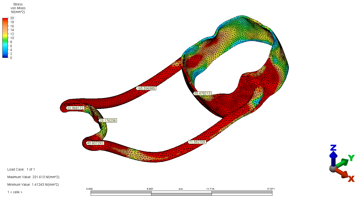 FSM with curved and surround arms. The von Mises Stress Scale
in Test Model 4 is shown using a stress scale and spatial coordinates.